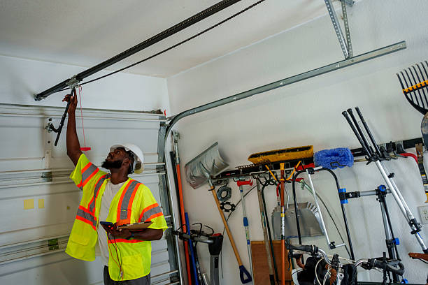 Professional Garage Door Panel Replacement technician working in Three Way, TN